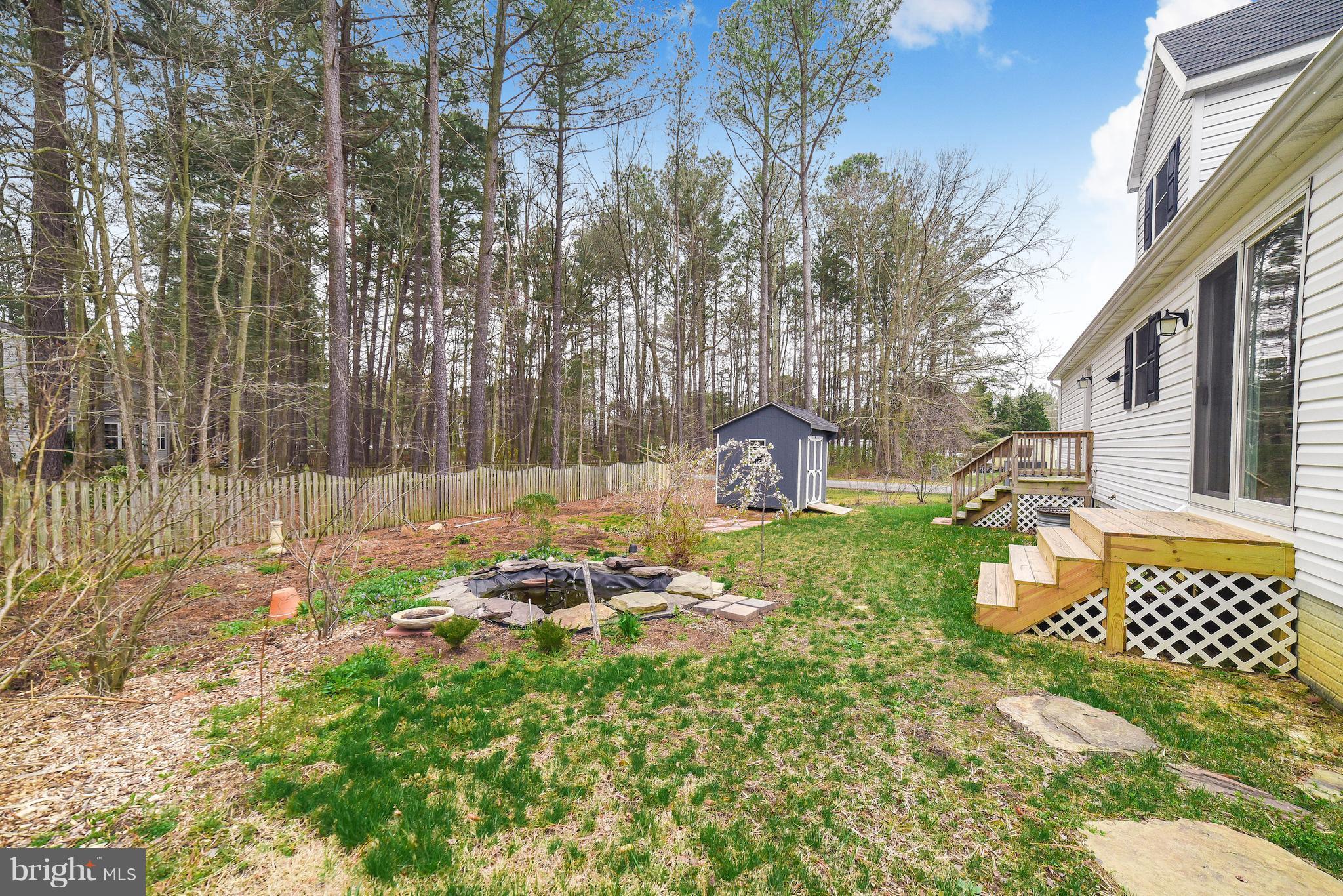 13521 Dowell Road Dowell, MD 20629 - Photo 28 of 30 Backyard has water feature