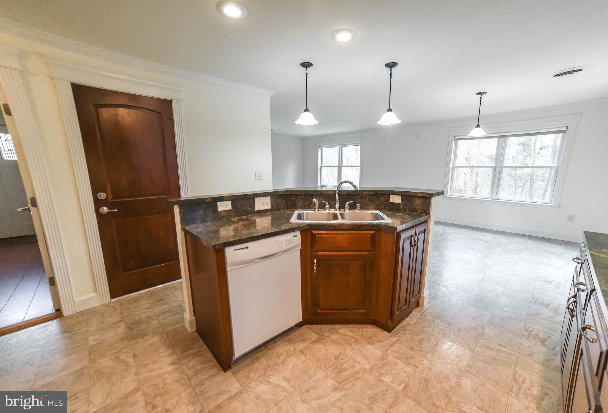 13521 Dowell Road Dowell, MD 20629 - Photo 8 of 30 Island provides good work triangle in kitchen