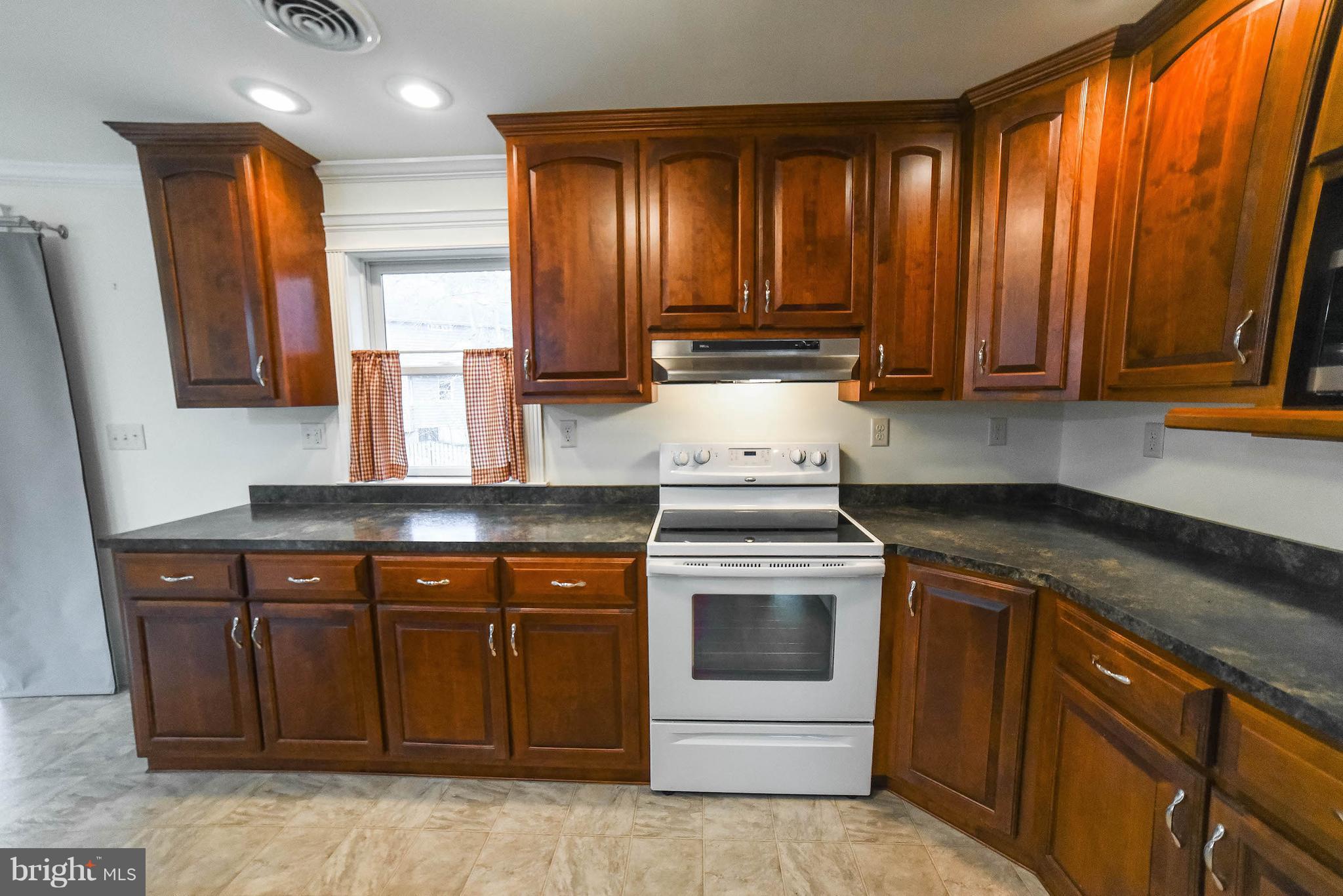 13521 Dowell Road Dowell, MD 20629 - Photo 9 of 30 Beautiful wood cabinets