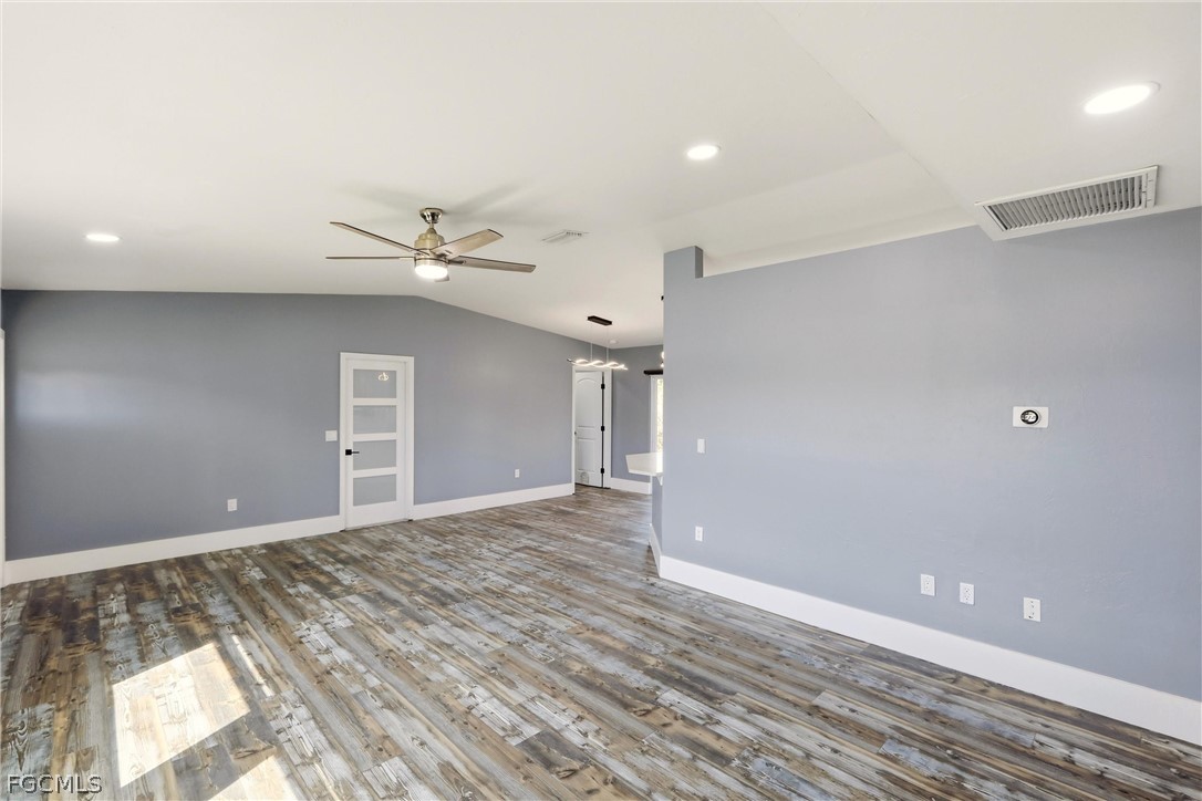 3404 2nd Street Southwest Lehigh Acres, FL 33976 - Photo 12 of 41 a view of a livingroom with a ceiling fan and window