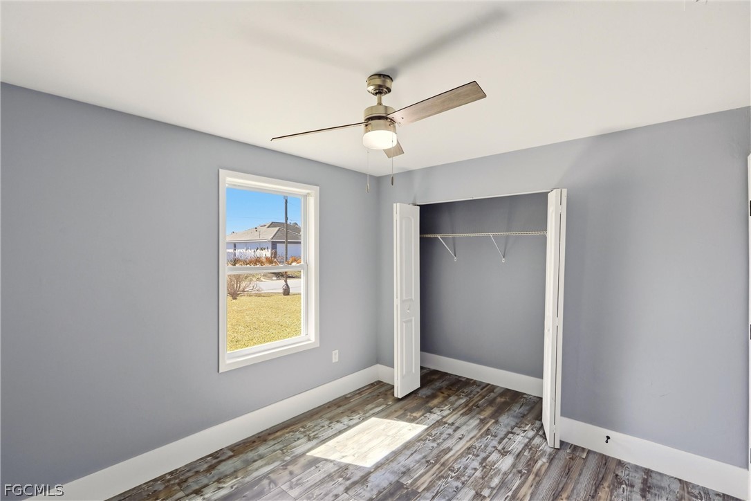 3404 2nd Street Southwest Lehigh Acres, FL 33976 - Photo 29 of 41 a view of an empty room and window