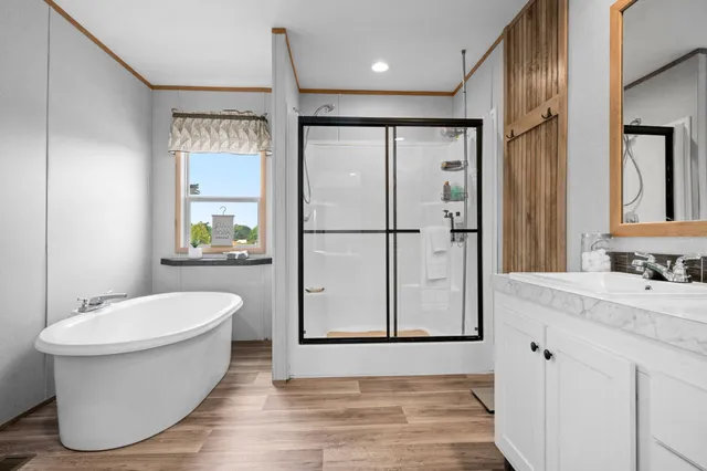 a bathroom with a bathtub and a sink