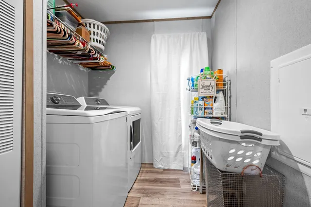 a utility room with dryer and washer