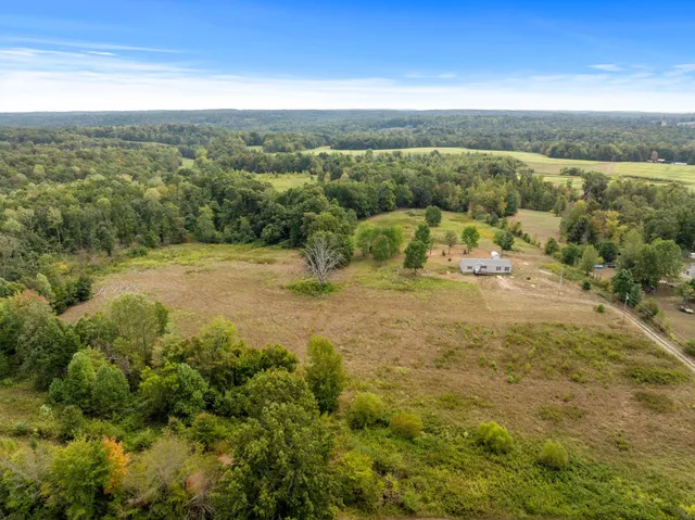 a view of a yard with an ocean