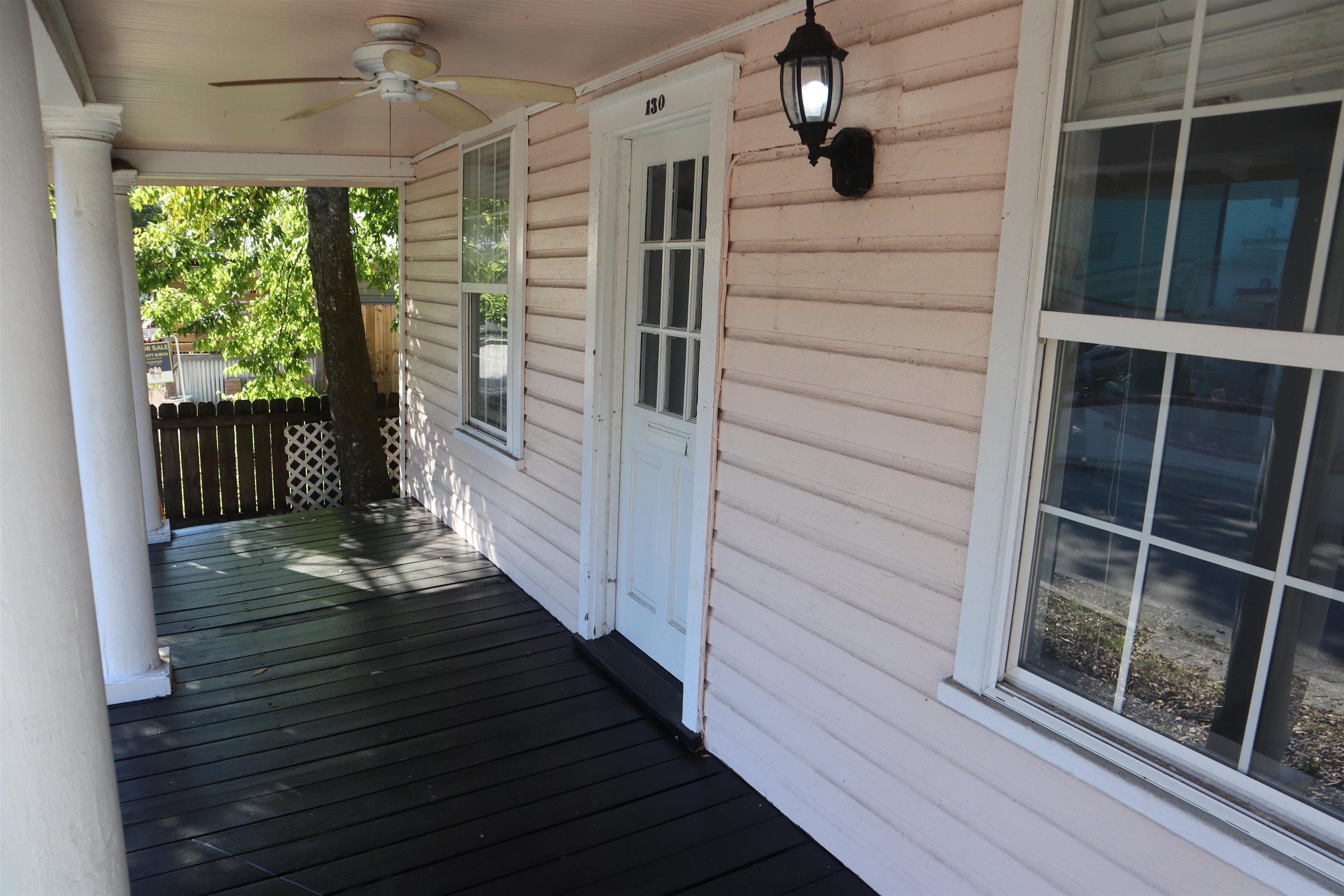 130 Moore Street St. Augustine, FL 32084 - Photo 18 of 27 a view of balcony with wooden floor and floor to ceiling window