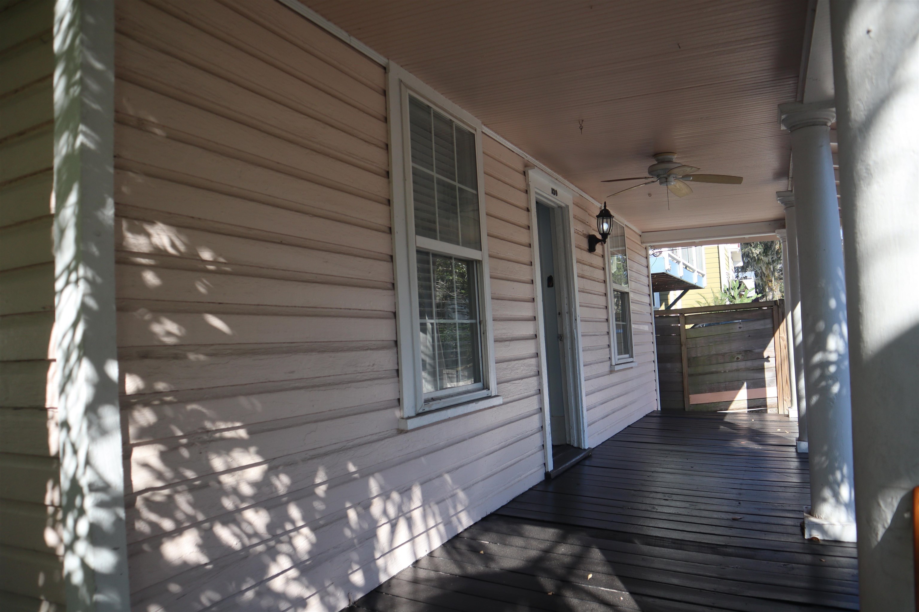 130 Moore Street St. Augustine, FL 32084 - Photo 22 of 27 a view of a house with stairs and wooden floor