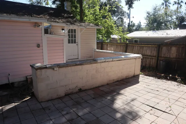 a view of a backyard with a tub