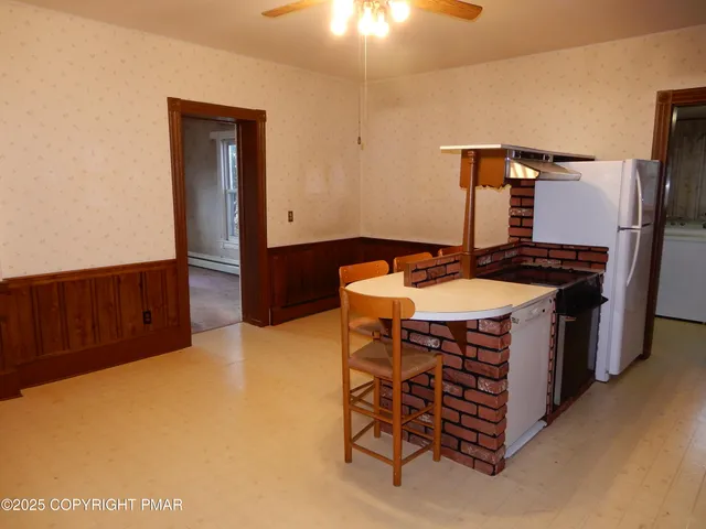 a room with furniture and washer