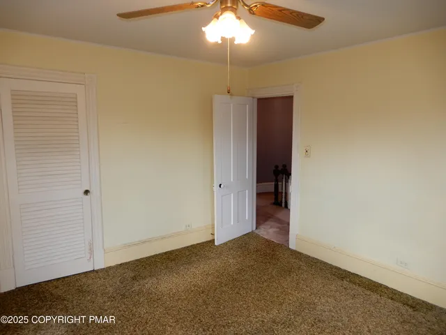 a bathroom with a sink vanity and a mirror