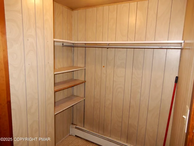 a bathroom with a granite countertop sink