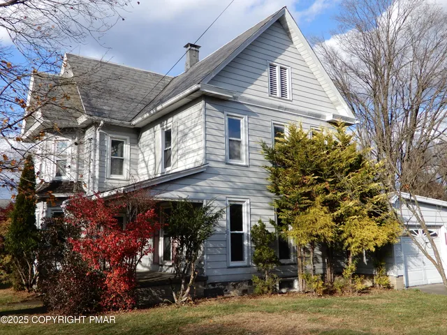 a view of a building with a street