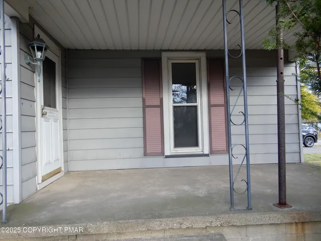 a view of entrance gate of the house