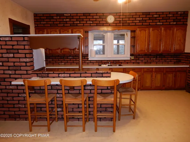 a view of a chairs and table in the terrace