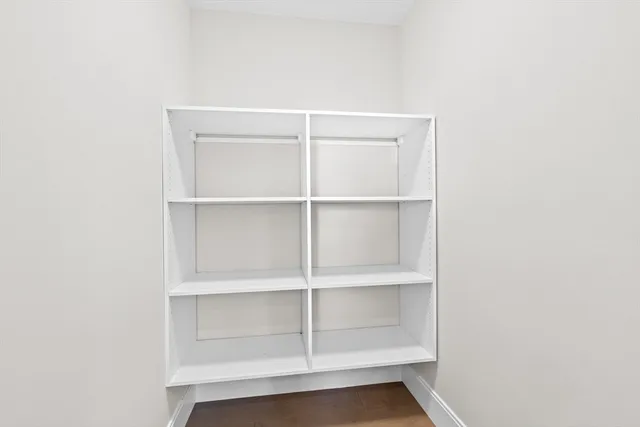 a view of an empty walk in closet