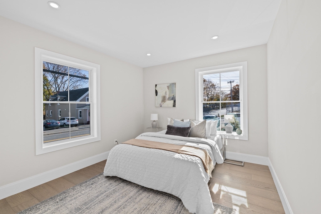 340 Baker Street, Unit 1 Boston, MA 02132 - Photo 22 of 41 a bedroom with a bed and a window
