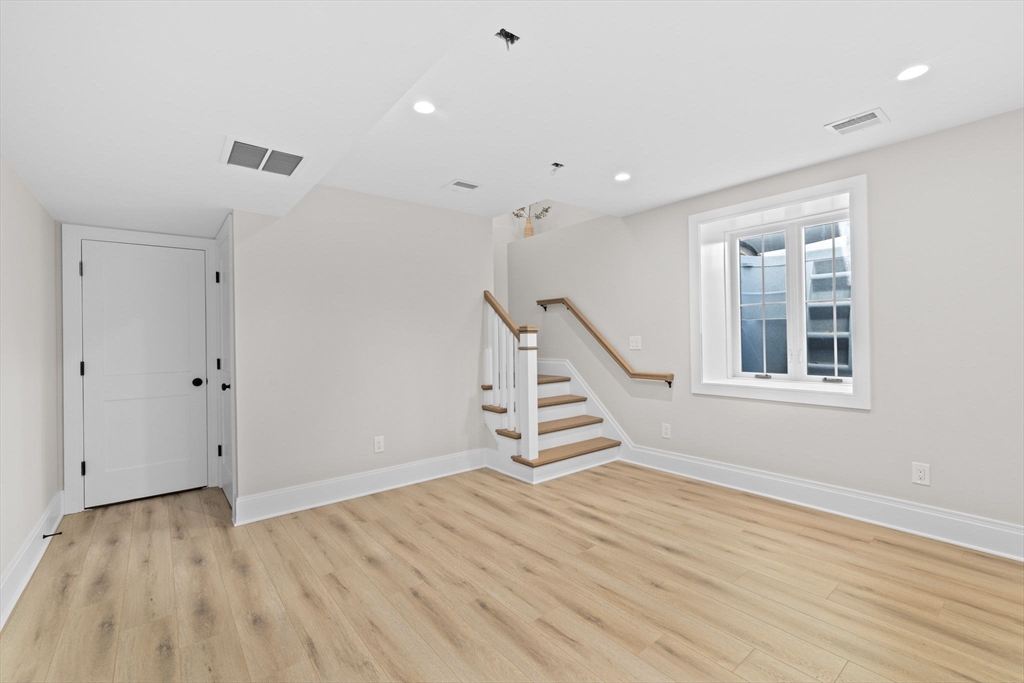340 Baker Street, Unit 1 Boston, MA 02132 - Photo 32 of 41 a view of an entryway with wooden floor