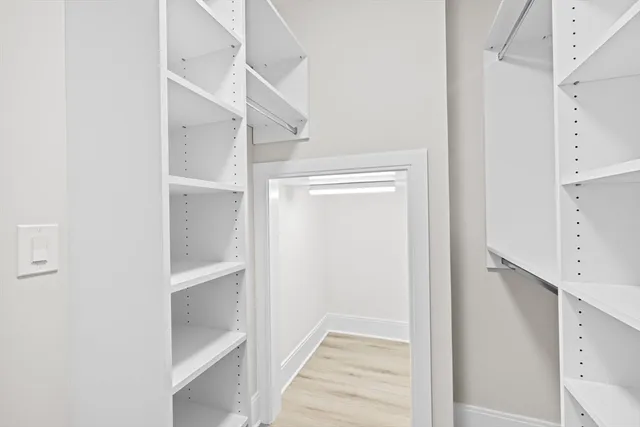 a view of staircase with white walls and white walls
