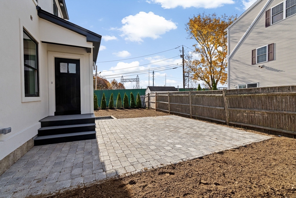 340 Baker Street, Unit 1 Boston, MA 02132 - Photo 39 of 41 a view of a backyard