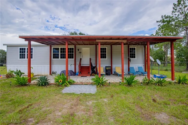 a front view of a house with a porch