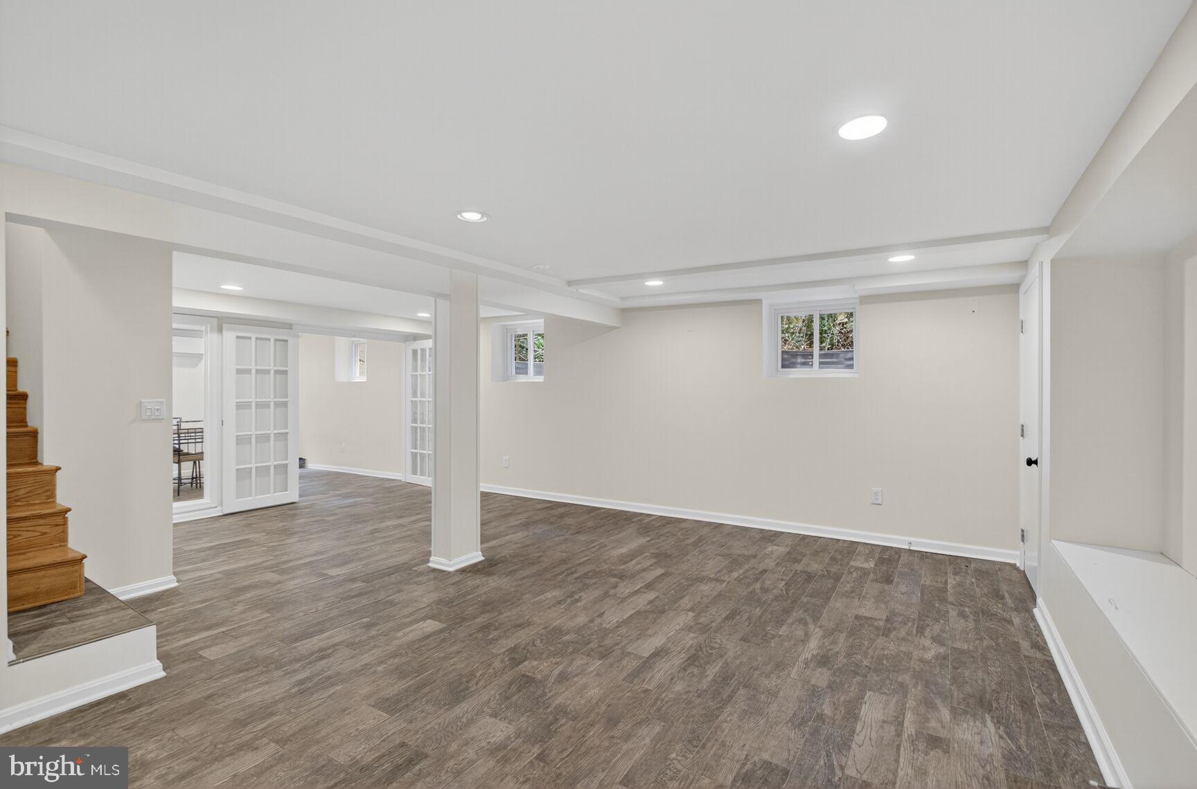 5241 42nd Street Northwest Washington, DC 20015 - Photo 25 of 45 wooden floor in an empty room with a window
