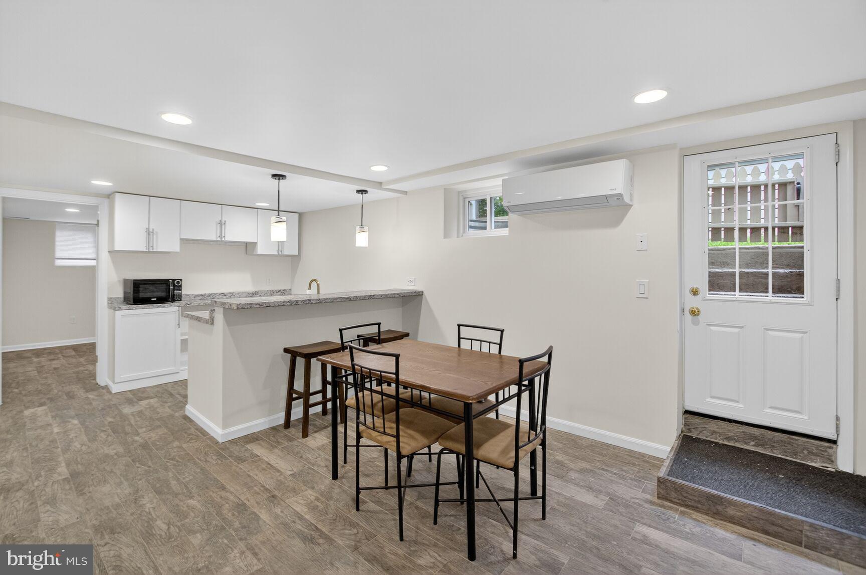 5241 42nd Street Northwest Washington, DC 20015 - Photo 29 of 45 a view of kitchen with cabinets table and chairs