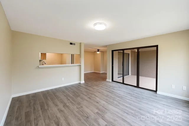 a kitchen with a sink cabinets and stainless steel appliances