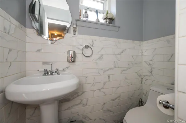a bathroom with a sink and a toilet