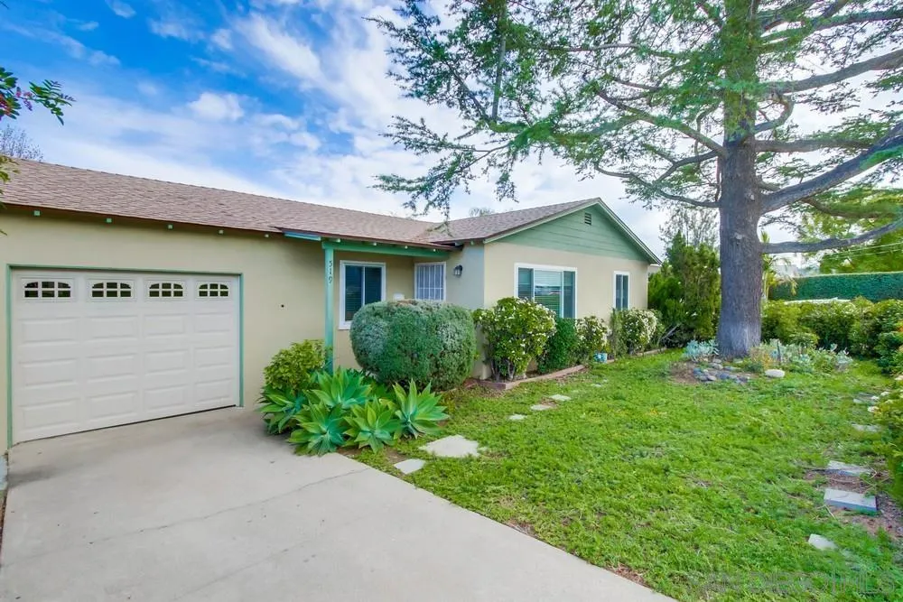 519 El Monte Road El Cajon, CA 92020 - Photo 3 of 3 a front view of a house with garden