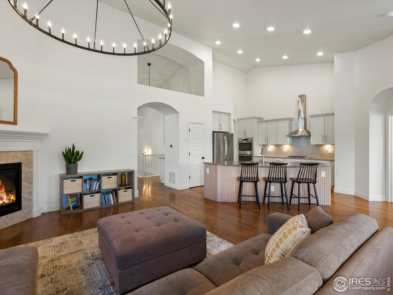 950 Sumner Way Erie, CO 80516 - Photo 38 of 40 Open floor plan from kitchen, living, dining.