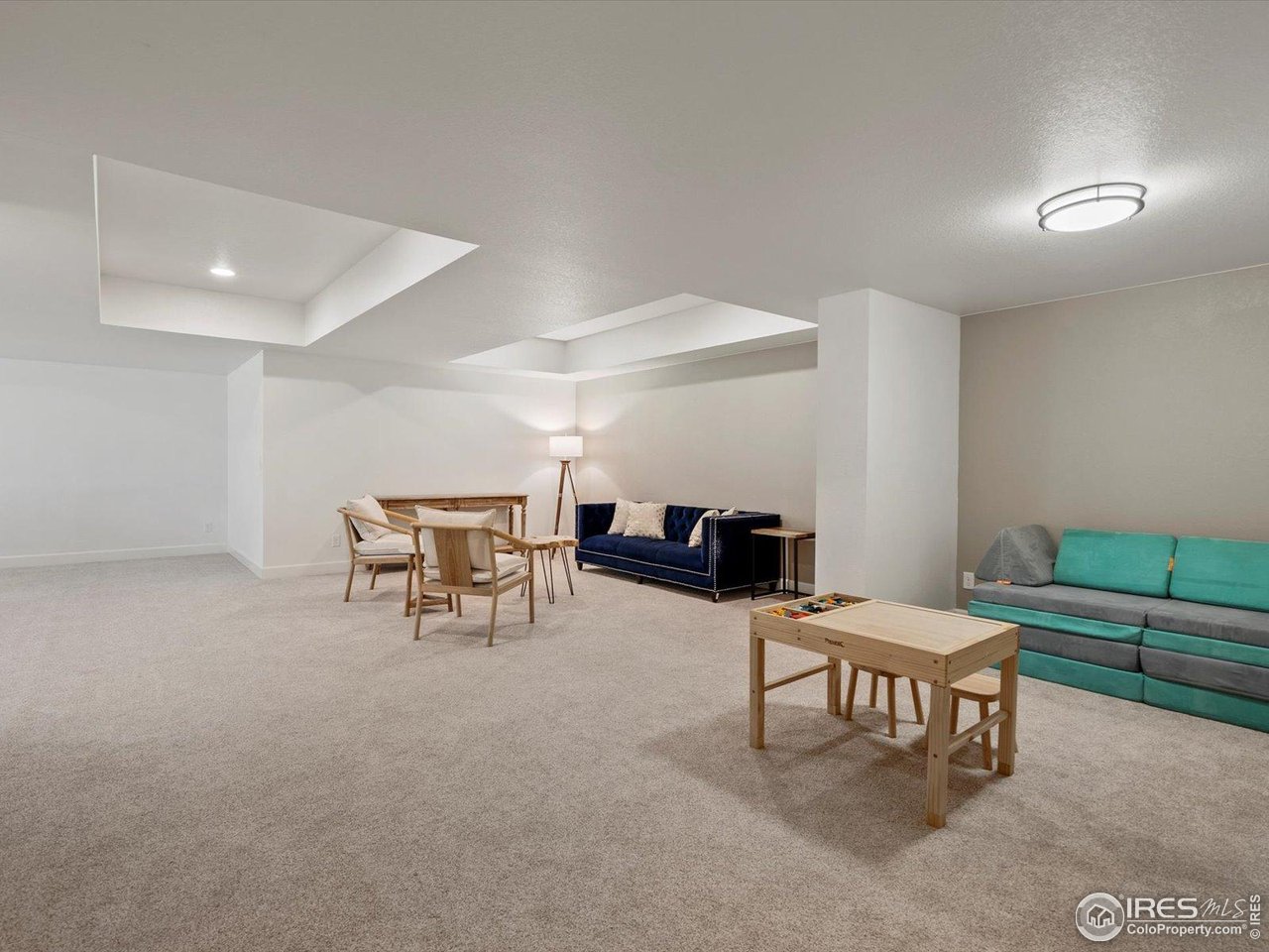 950 Sumner Way Erie, CO 80516 - Photo 20 of 40 Expansive full finished basement with multiple living spaces