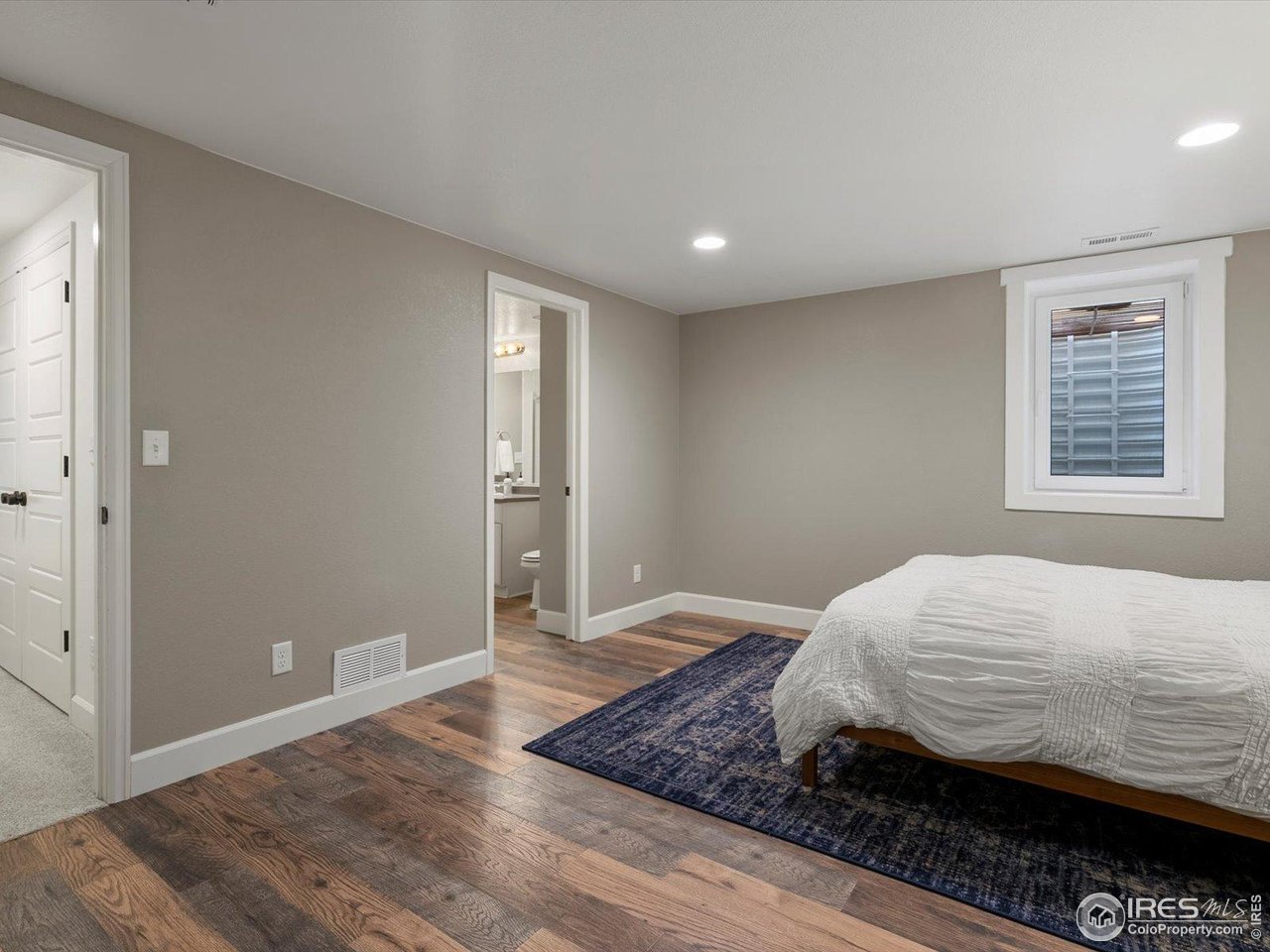 950 Sumner Way Erie, CO 80516 - Photo 26 of 40 Basement bedroom with en suite bath