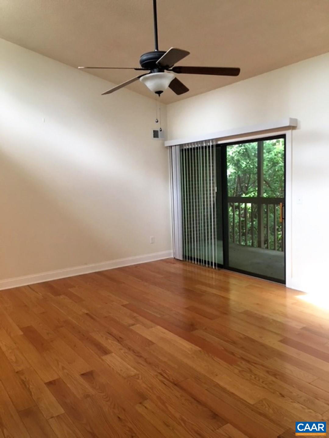 114 Turtle Creek Road, Unit 8 Charlottesville, VA 22901 - Photo 1 of 7 a view of an empty room with a window