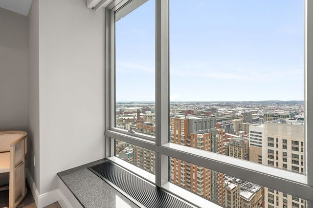 a view of a balcony with city