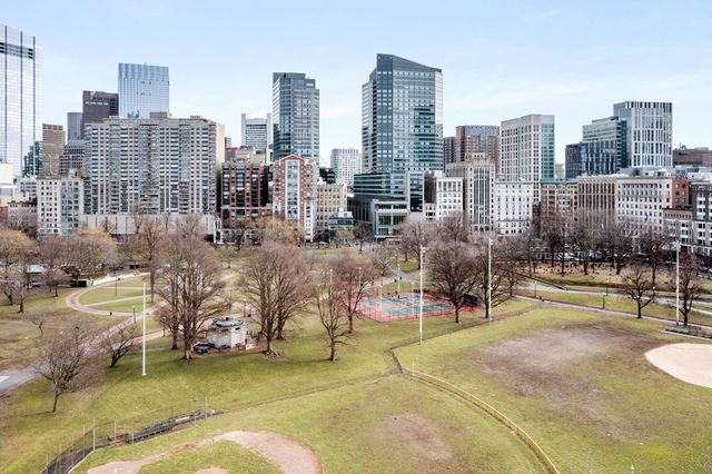 a view of city with tall buildings