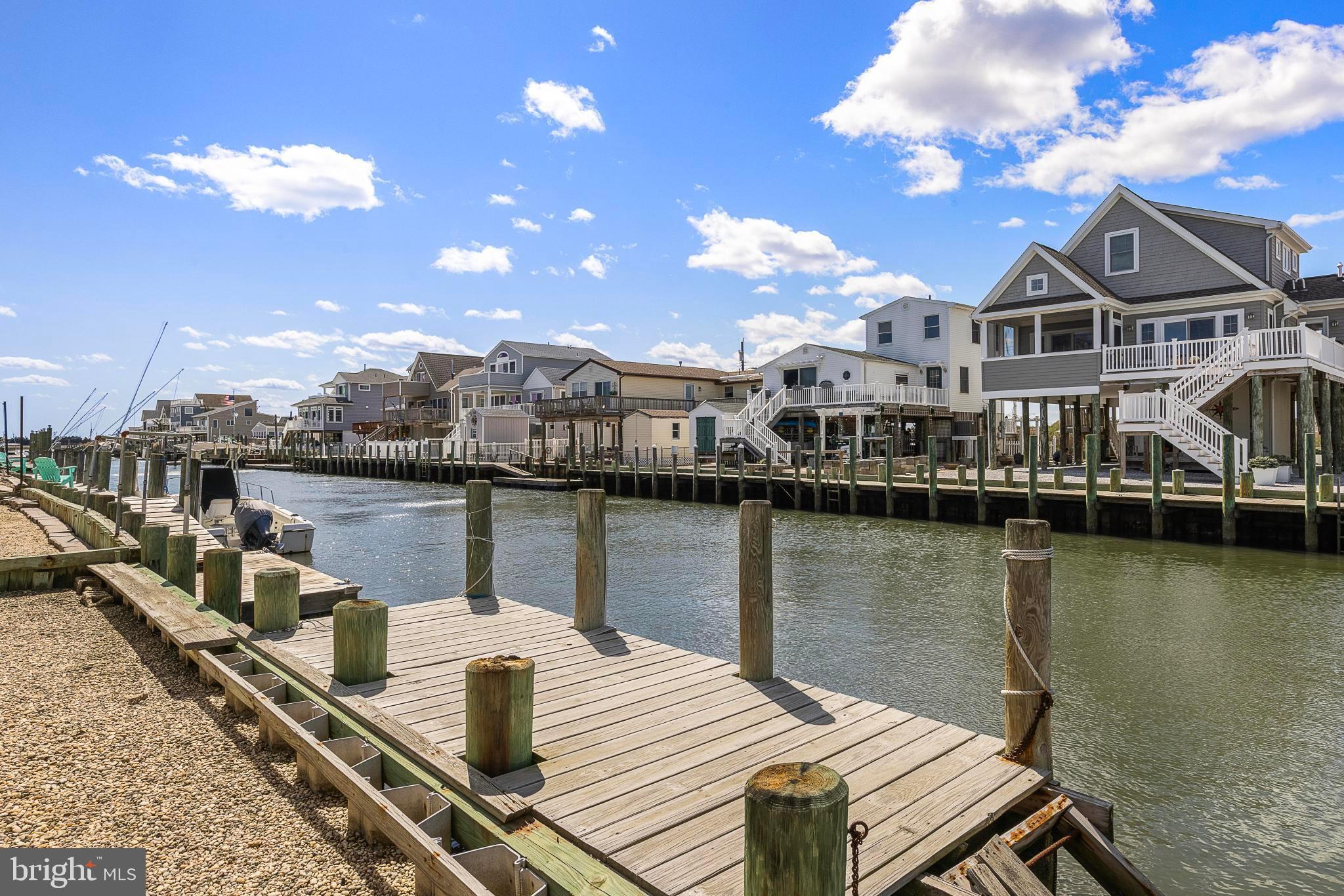 27 Parker Road Tuckerton, NJ 08087 - Photo 18 of 24 a view of a lake with a house