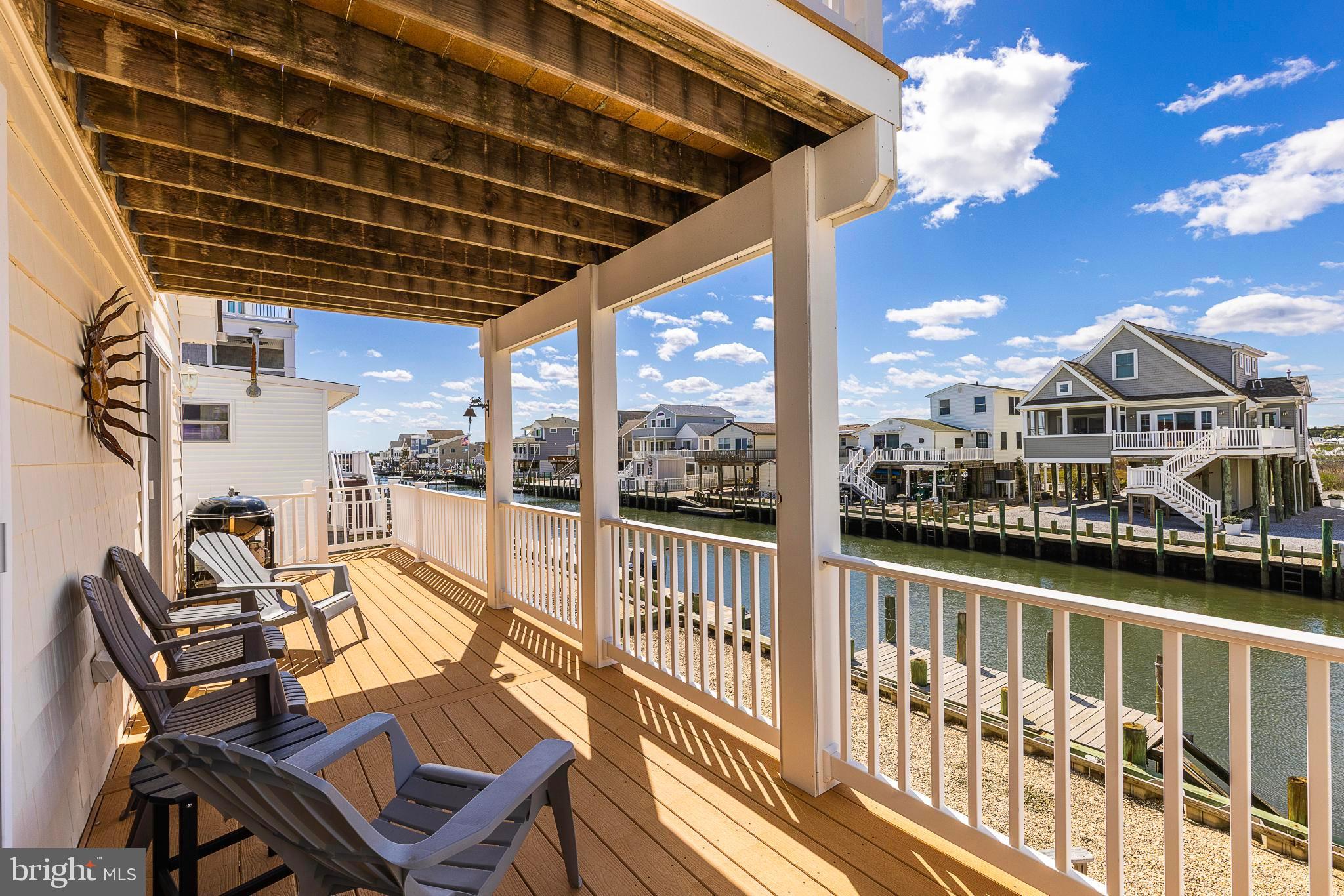 27 Parker Road Tuckerton, NJ 08087 - Photo 23 of 24 a view of a chairs and table in patio with a barbeque grill and plants