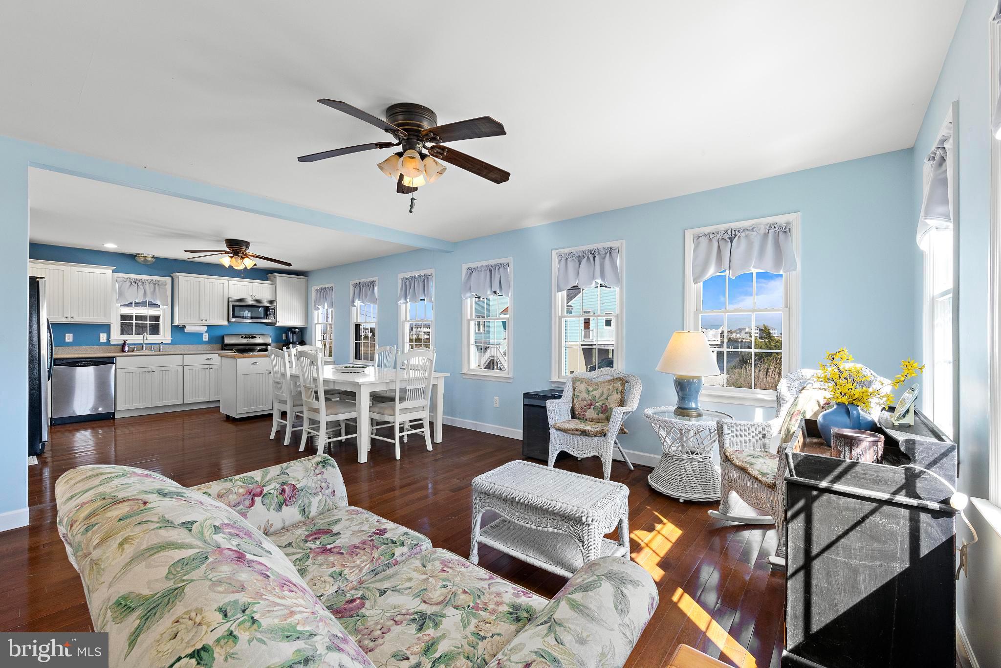 27 Parker Road Tuckerton, NJ 08087 - Photo 8 of 24 a living room with furniture and a dining table