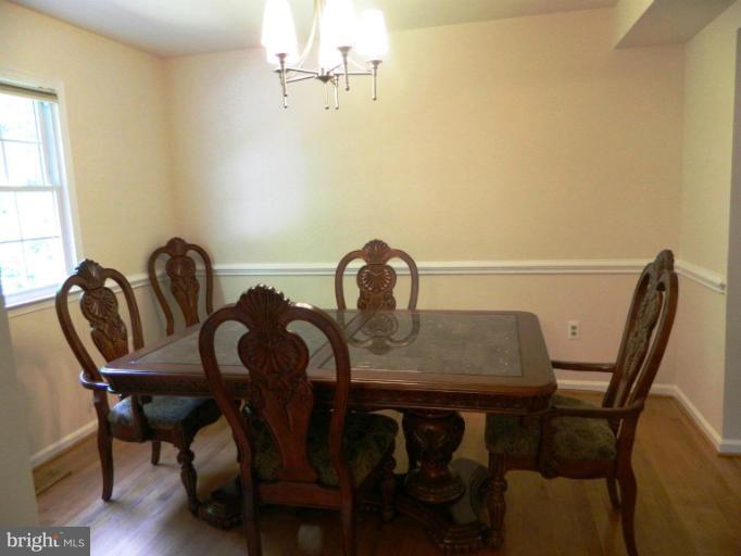 13289 Kenny Road Woodbridge, VA 22193 - Photo 14 of 23 a view of a dining room with furniture and window