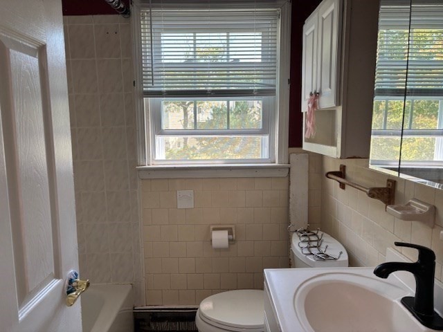 4 Bartlett Drive, Unit A Woburn, MA 01801 - Photo 11 of 14 a bathroom with a sink toilet and window