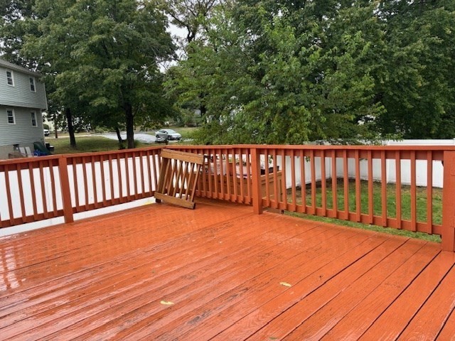 4 Bartlett Drive, Unit A Woburn, MA 01801 - Photo 4 of 14 a view of deck with a flat screen tv