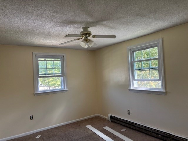 4 Bartlett Drive, Unit A Woburn, MA 01801 - Photo 8 of 14 a view of an empty room with a window