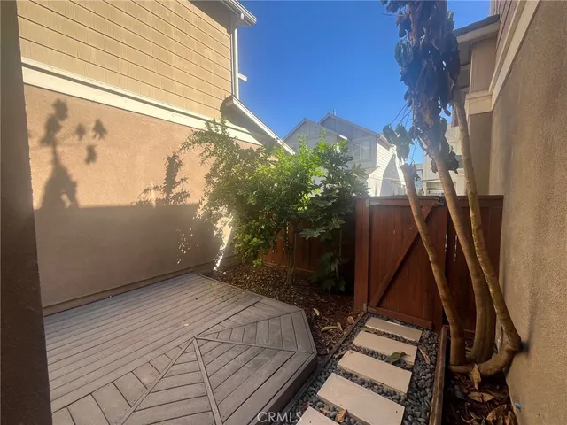 a view of balcony with wooden floor