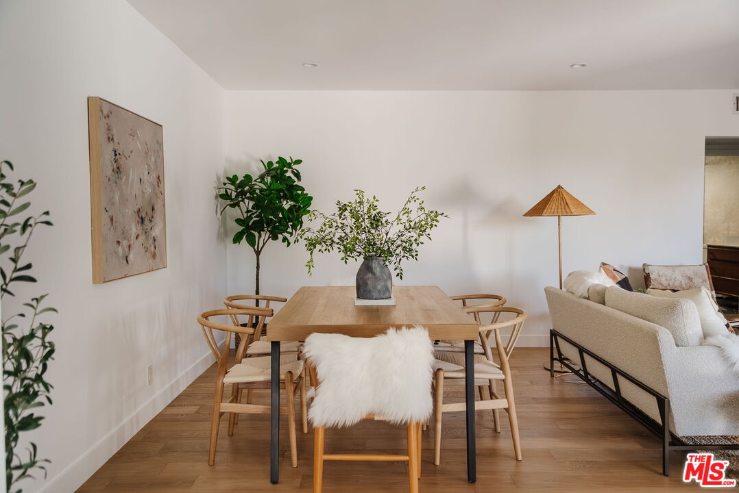 1943 12th, Unit 2 Santa Monica, CA 90404 - Photo 16 of 38 a dining room with furniture and wooden floor