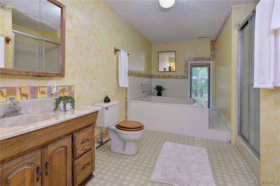 207 Stonehouse Road Williamsburg, VA 23188 - Photo 33 of 46 1st floor primary bedroom bathroom