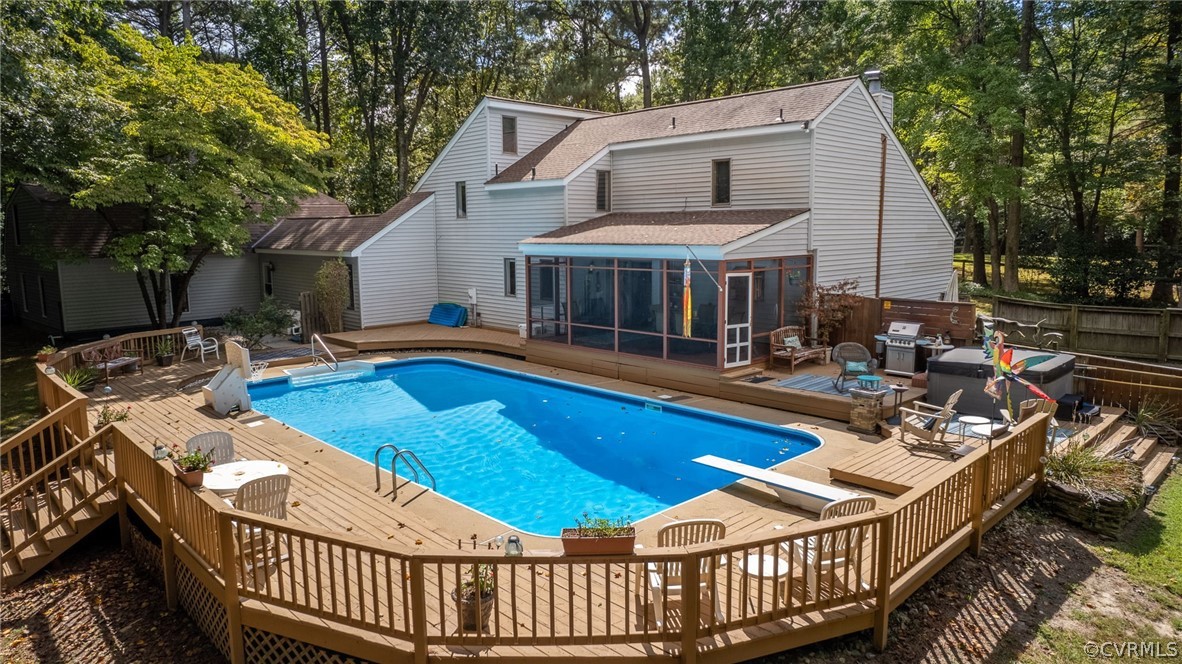 207 Stonehouse Road Williamsburg, VA 23188 - Photo 7 of 46 In-ground pool with patio and deck