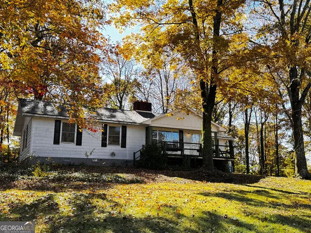 a view of a house with swimming pool