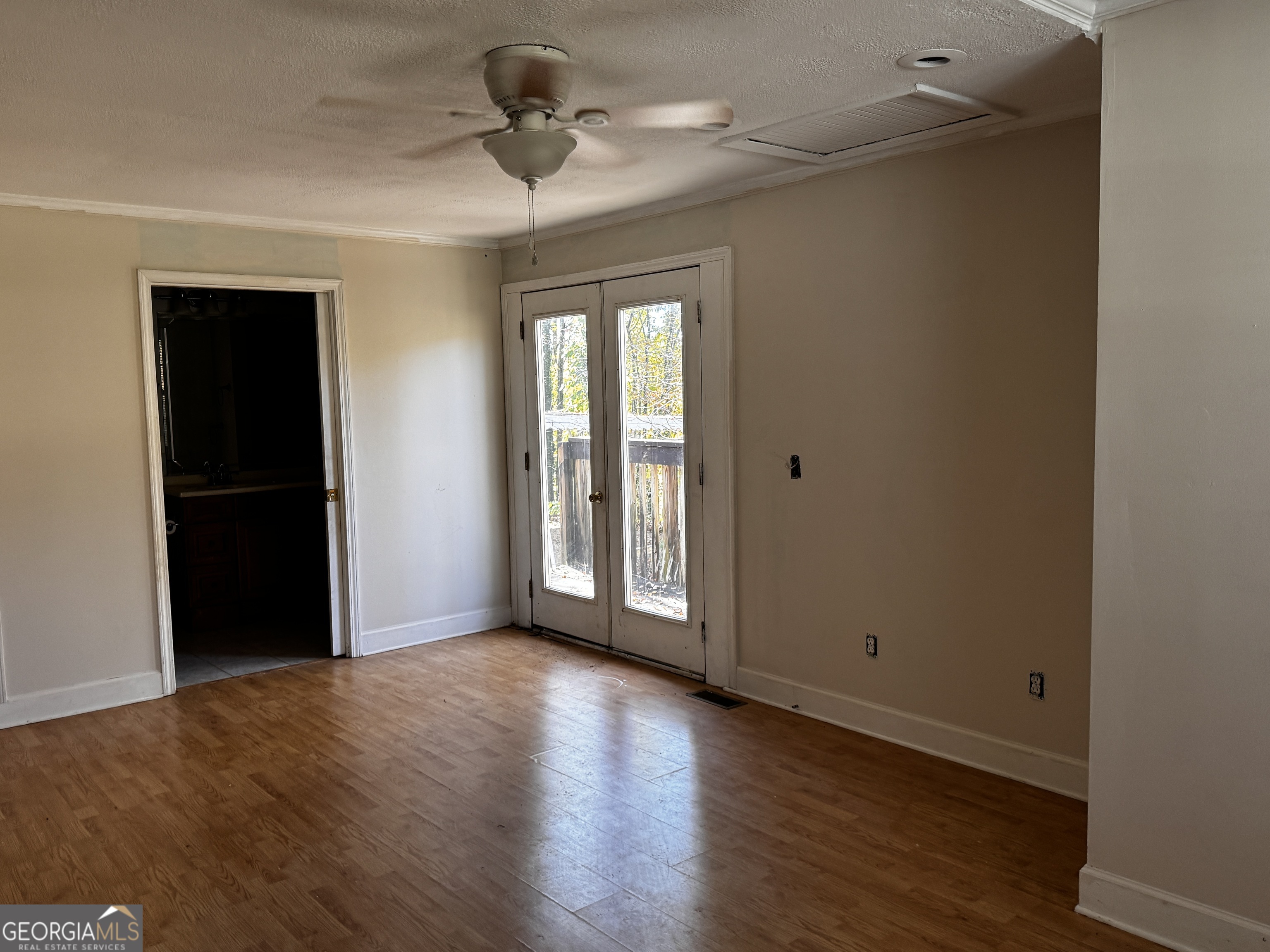 22 Ilene Drive Cleveland, GA 30528 - Photo 27 of 53 a view of an empty room with wooden floor and a window