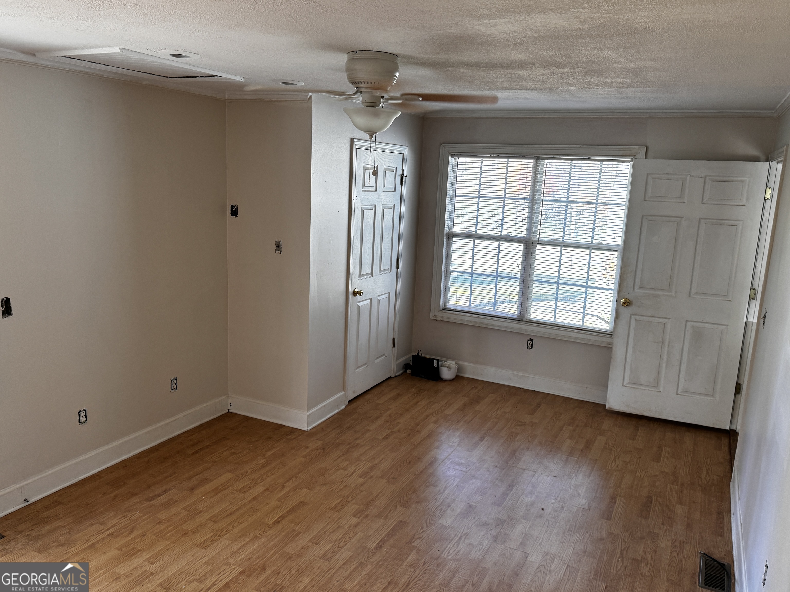 22 Ilene Drive Cleveland, GA 30528 - Photo 31 of 53 a view of an empty room with wooden floor and a window