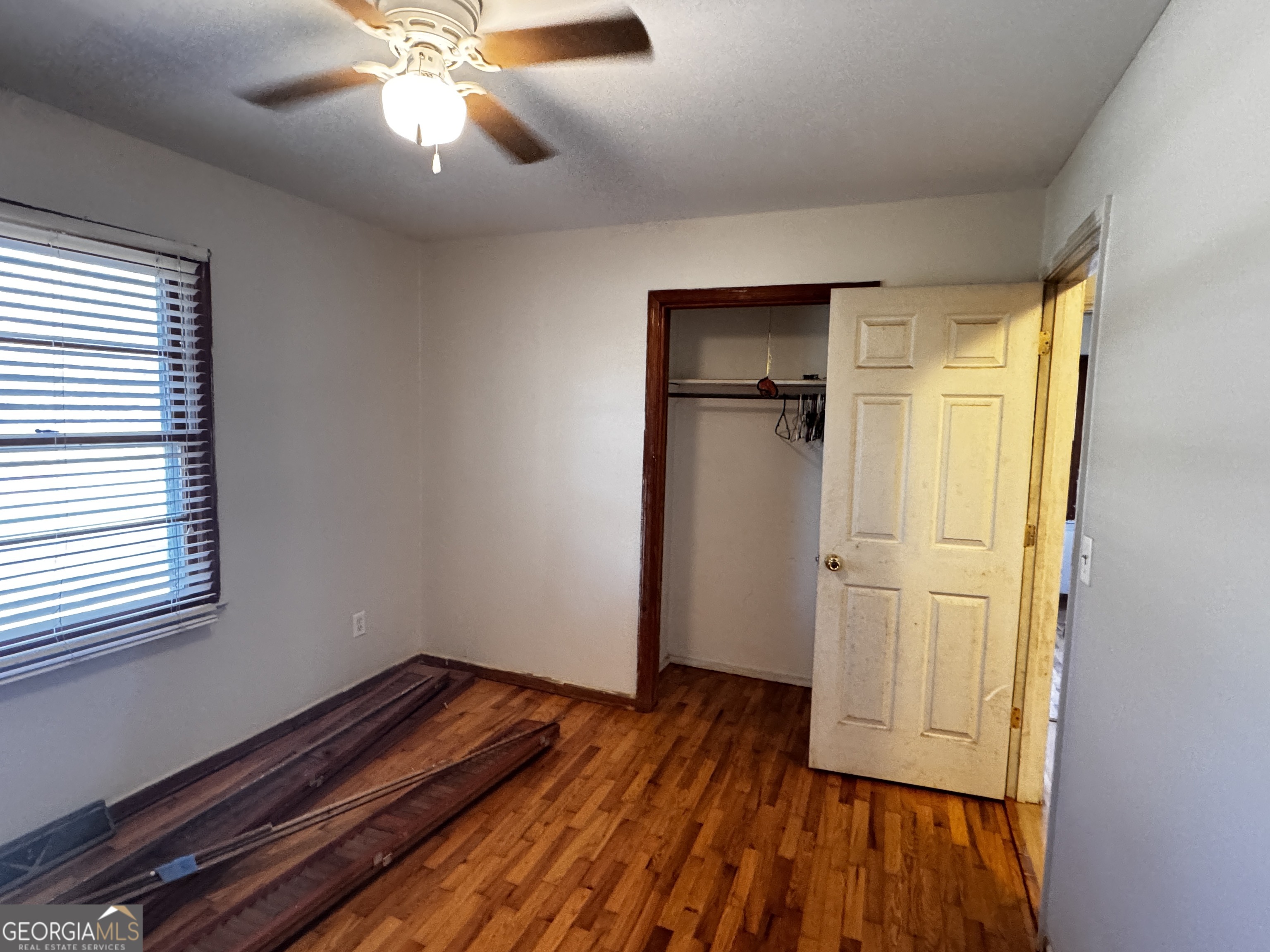 22 Ilene Drive Cleveland, GA 30528 - Photo 39 of 53 a view of empty room with wooden floor and fan