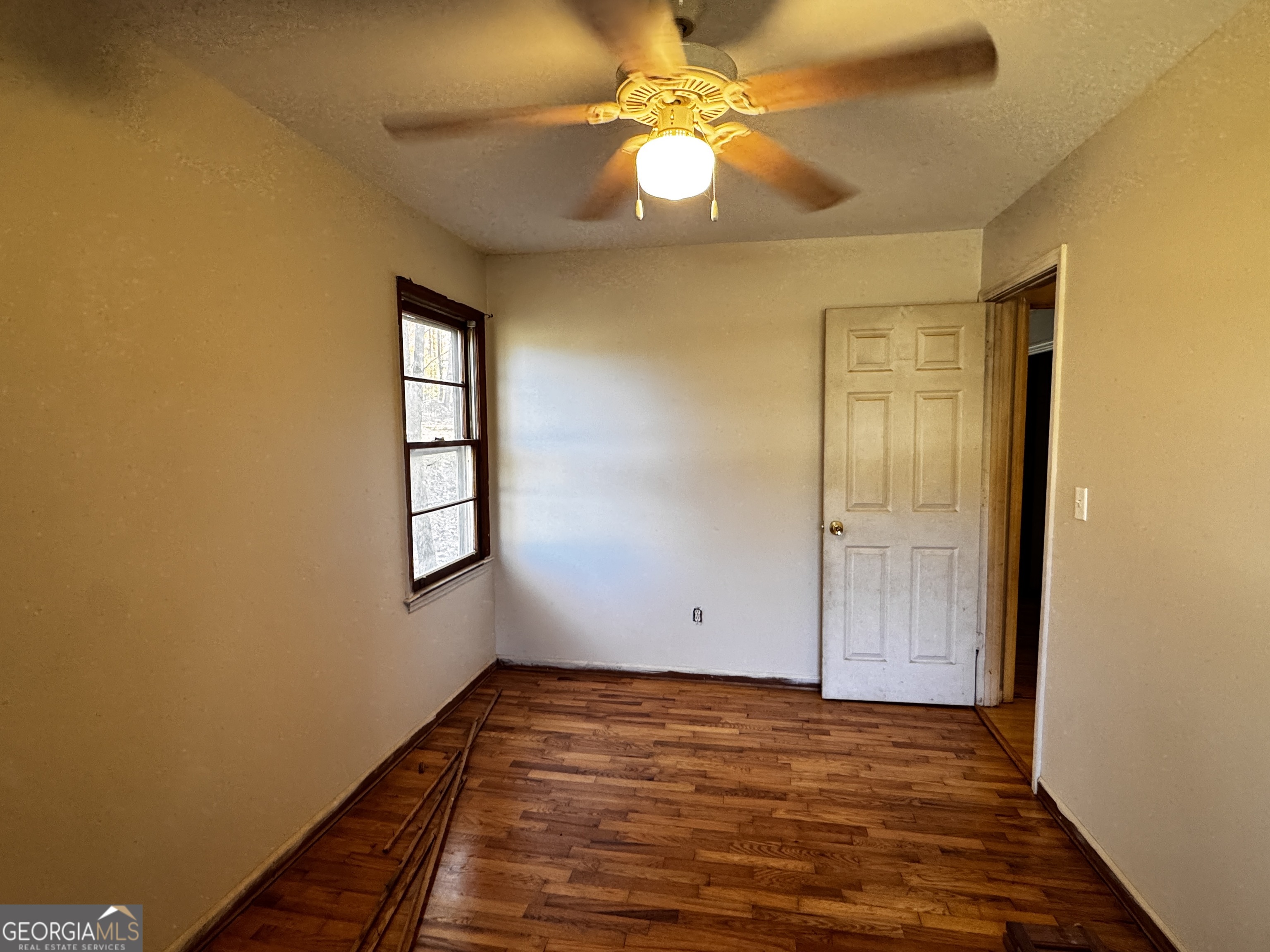 22 Ilene Drive Cleveland, GA 30528 - Photo 41 of 53 wooden floor in an empty room with a window
